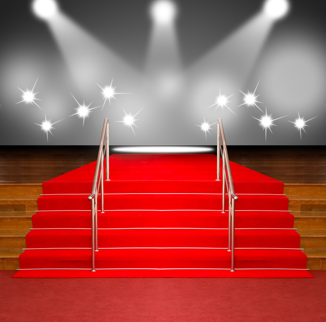 red carpet on wood stairs